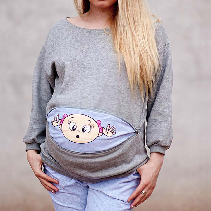 Plus size pregnant woman cartoon cute long sleeve featuring a cartoon design and comfortable loose fit