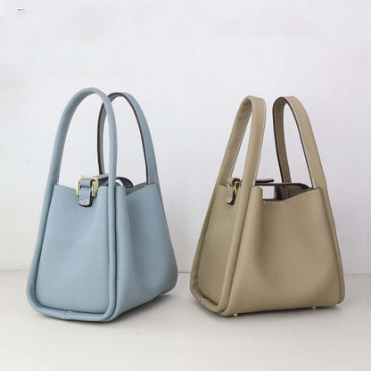 Make Your Own Leather Bags Hand Sewing Handmade Leather Goods in blue and beige.