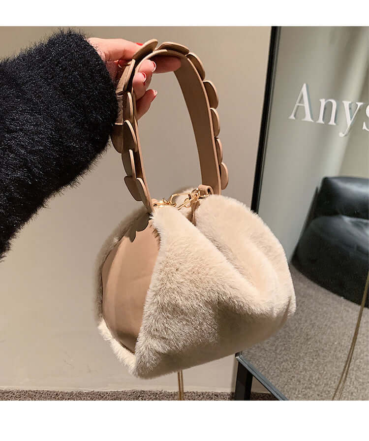Autumn And Winter Small Furry Crossbody Hand Bag Female Bags with soft texture and zipper closure.