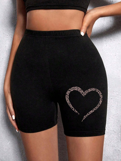 Summer Woman Tight Shorts Leopard Heart And Love Letter Grap featuring a stylish black design with a leopard heart accent.
