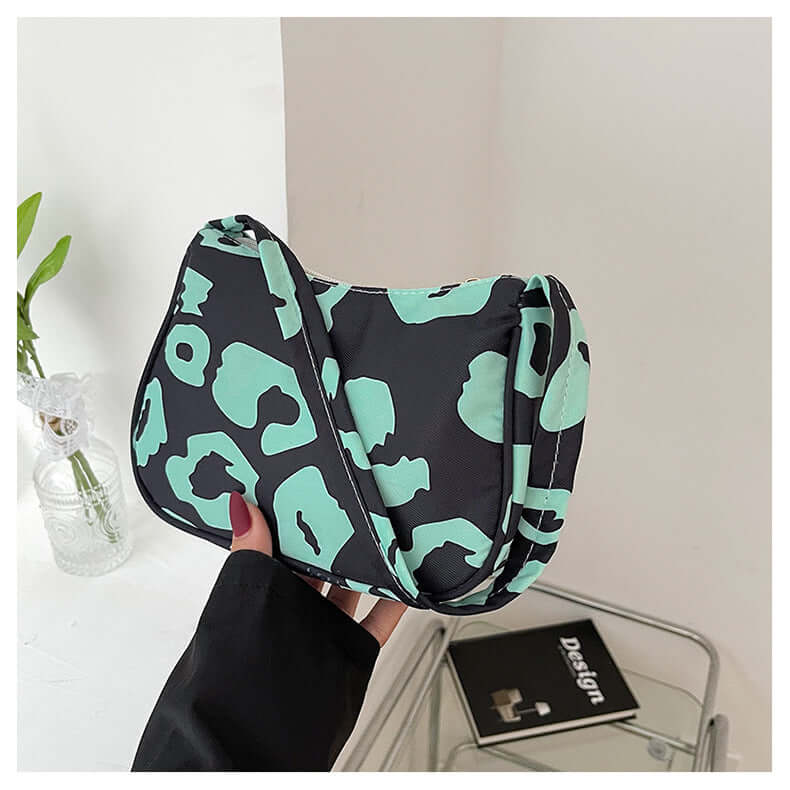 Korean Street Trend Hand-carried Women's Bags in a stylish black and mint leopard print design.