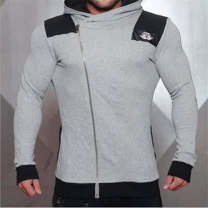 New Gyms Slim Fit Hoodies modeled by a man in a stylish gray zip-up hoodie with black accents.