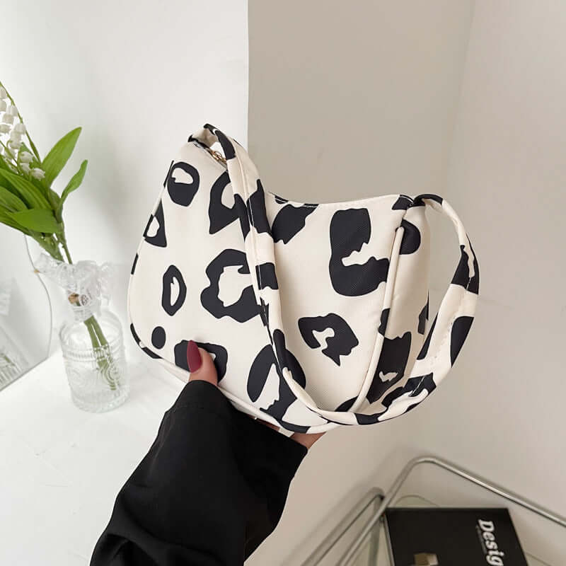 Korean Street Trend Hand-carried Women's Bags in leopard print design, stylish and perfect for daily use.
