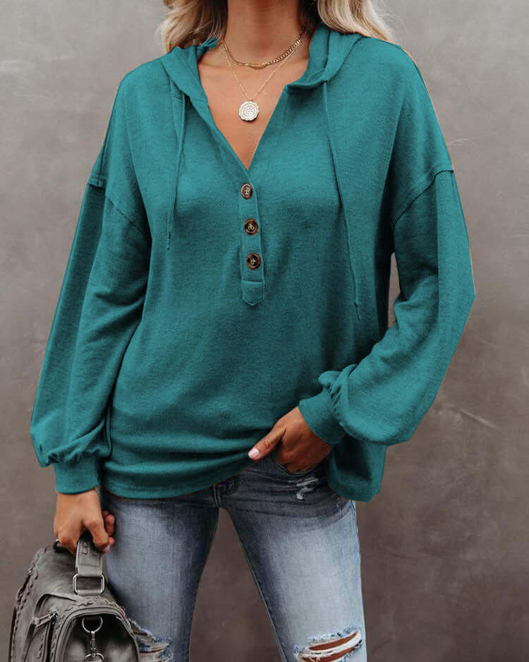 Autumn and Winter Solid Color Loose Hooded Woman in teal with button details and relaxed fit.