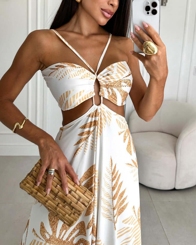 Fashion Printed Dress For Woman worn by a model, featuring a stylish cut-out design with leaf patterns in a light color.