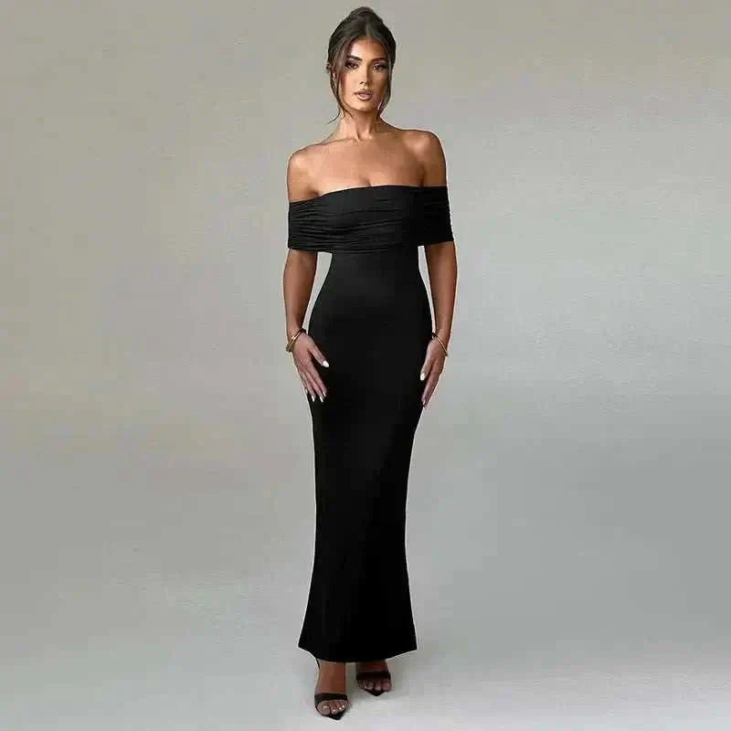 Elegant black off-shoulder backless dress showcasing a slim-fit silhouette, ideal for formal occasions.