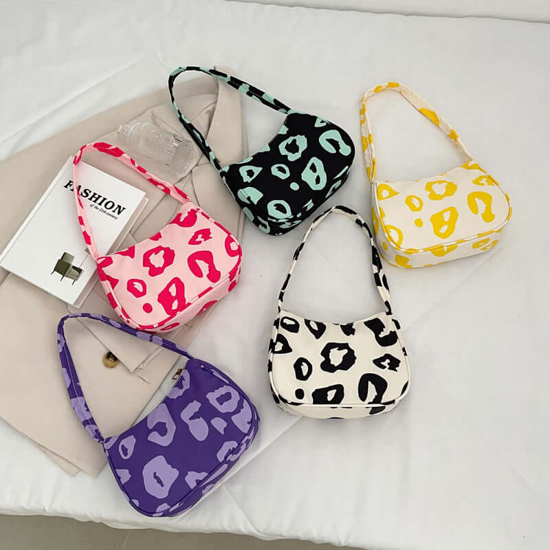 Korean Street Trend Hand-carried Women's Bags in vibrant colors featuring stylish patterns on nylon material.