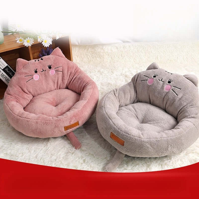 Trending cartoon pet bed in pink and gray cat designs, soft fabric for dogs and cats, perfect for pet comfort.